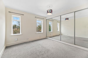 Bedroom One- click for photo gallery